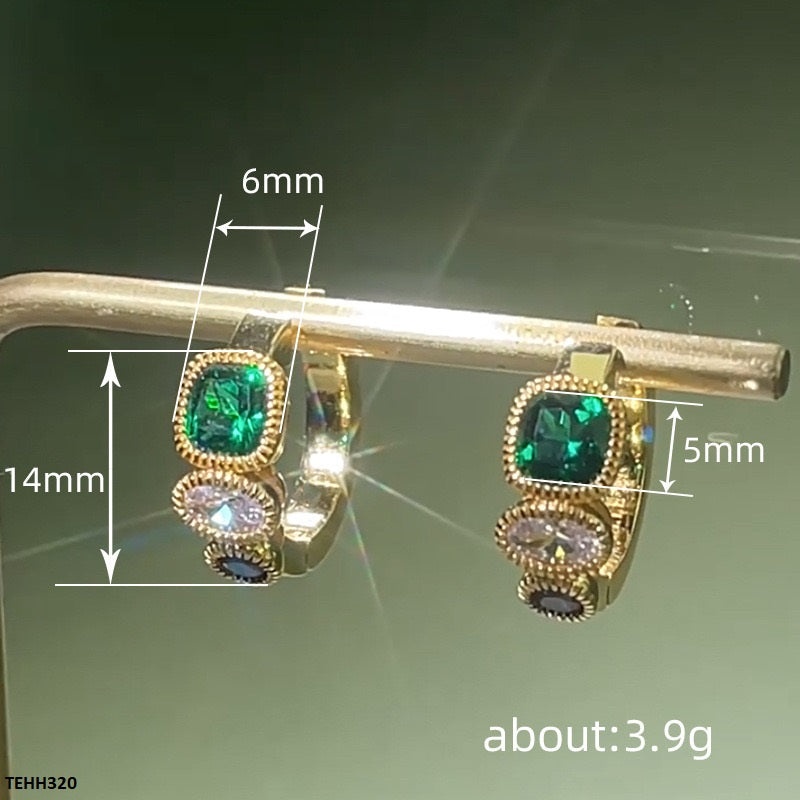 Minimalist circle hoops with emerald accents