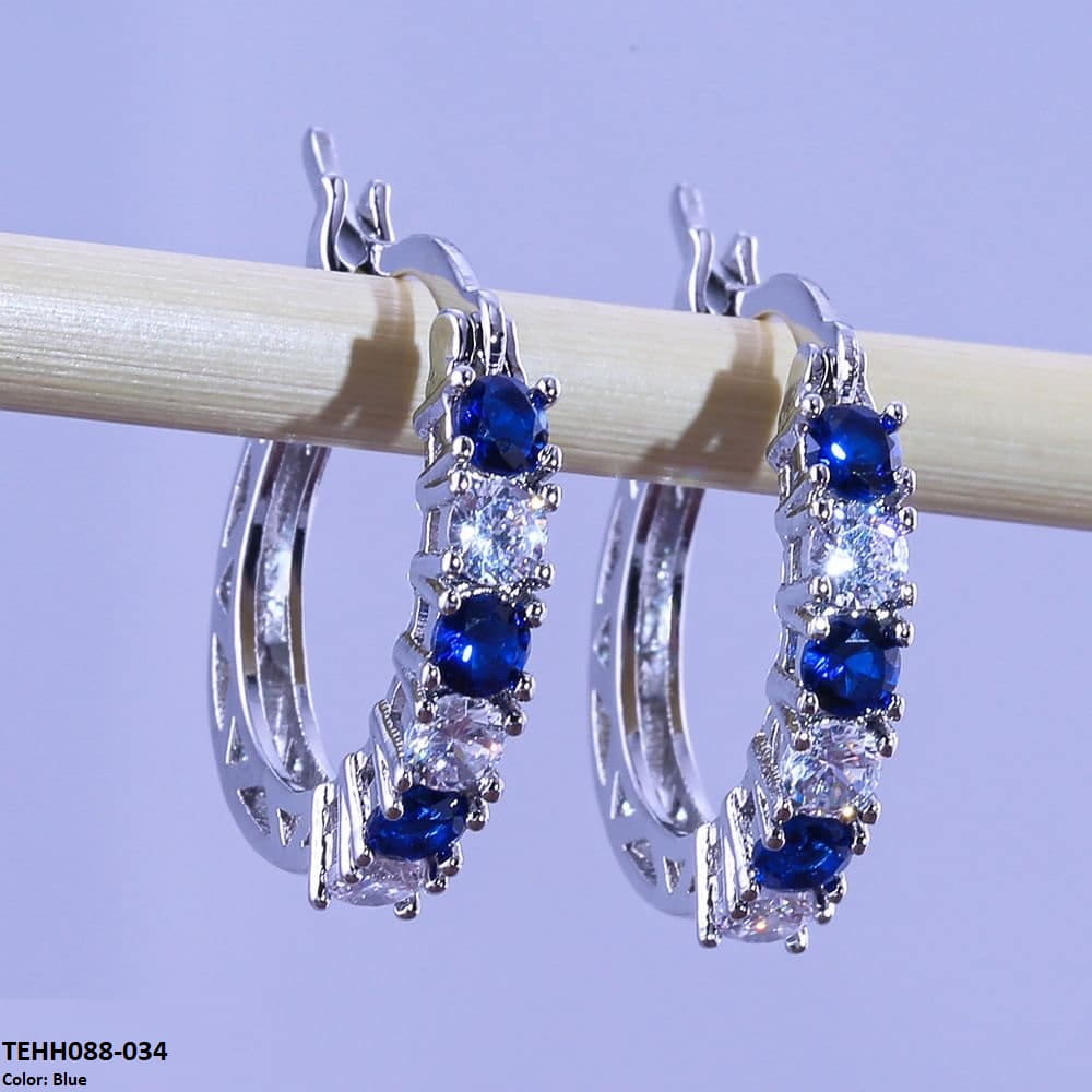 Sapphire hoops with zircon stones