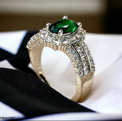 Emerald-toned zircon ring with silver/rhodium plating  