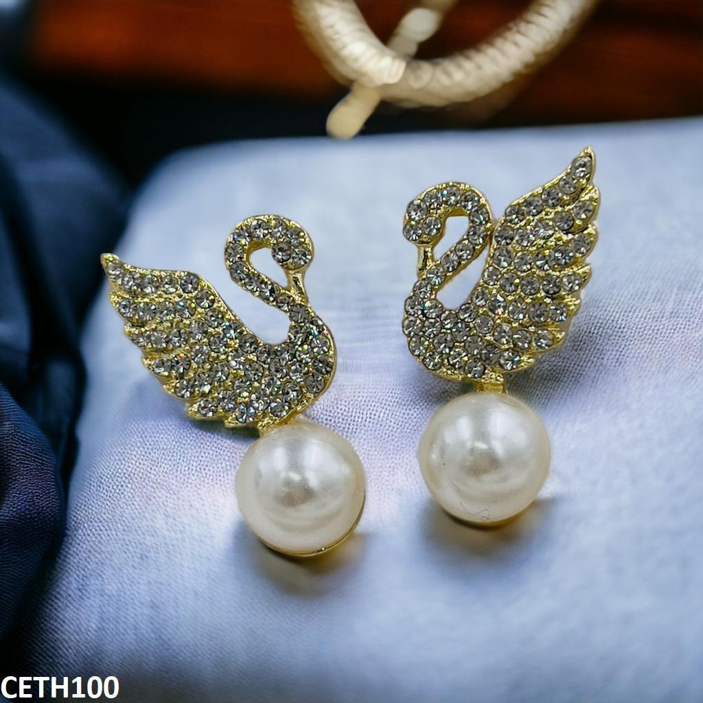 Gold-plated duck earrings with pearls  