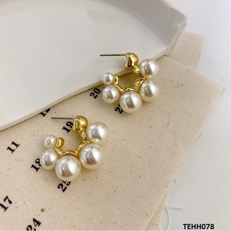 Gold Pearl Hoops Pair close-up view. 