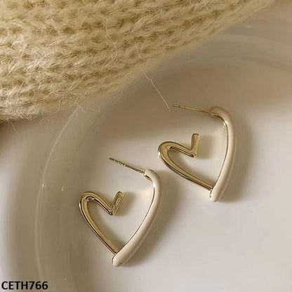 Golden plated open heart earrings  