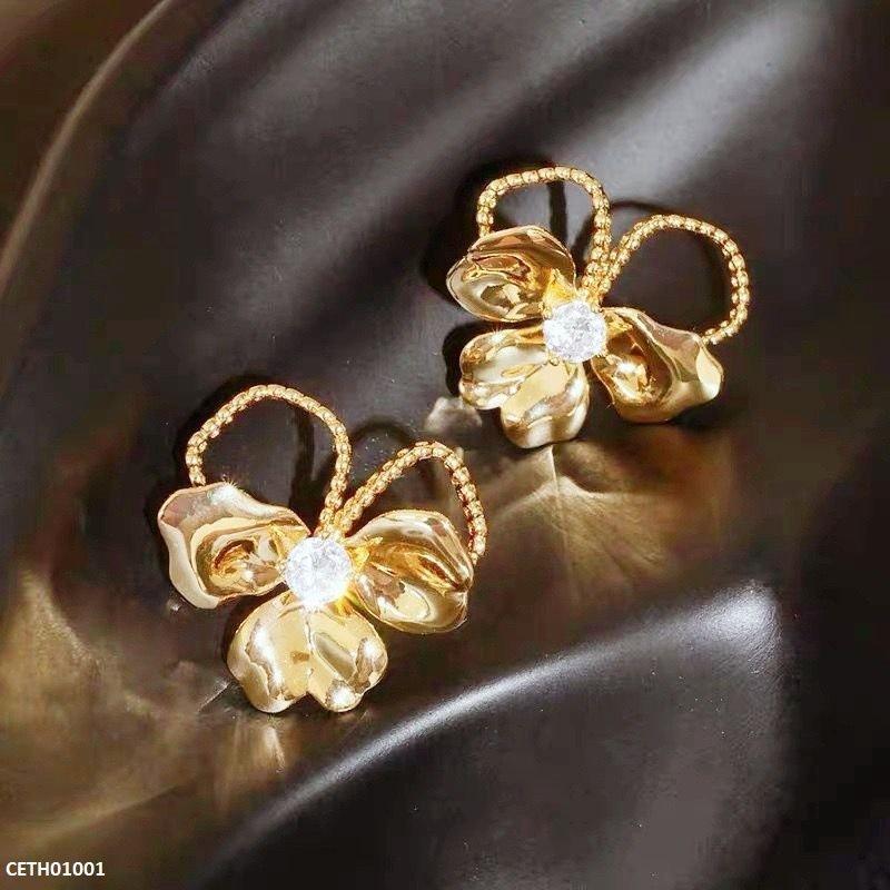 Half-flower earrings for party looks  