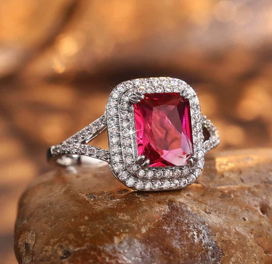 Women's Ruby V Cushion Imp Ring available in sizes 6, 7, and 8